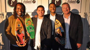 Sal Masekela, mentee Erick Tobar, Stoked founder Steve Larosiliere, and 2009 Achievement Award recipient, Quiksilver CEO Bob McKnight at the 2009 Stoked Awards